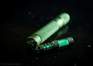 Isotope Chain Reaction Glow Fob on green flashlight