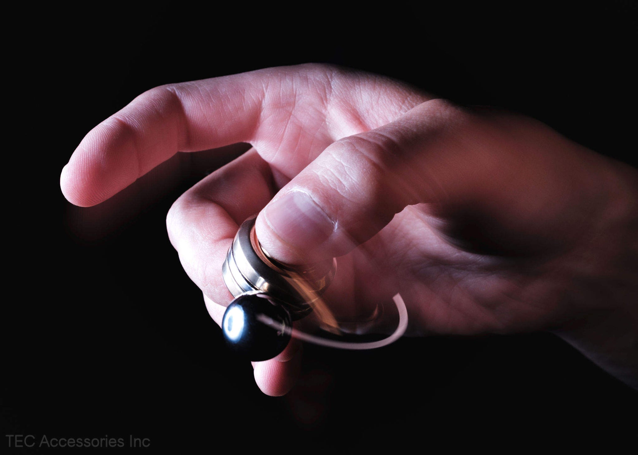 Orbiter™ Aluminum Bronze Edition spinning in hand