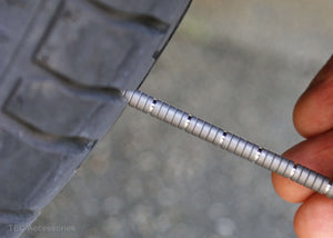 Centipede ruler measuring tire tread depth