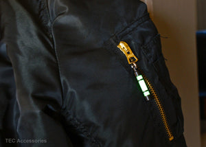 Glow fob jacket zipper pull