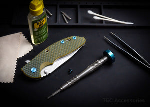 Micro-Torq titanium hex bit driver to lubricate knife