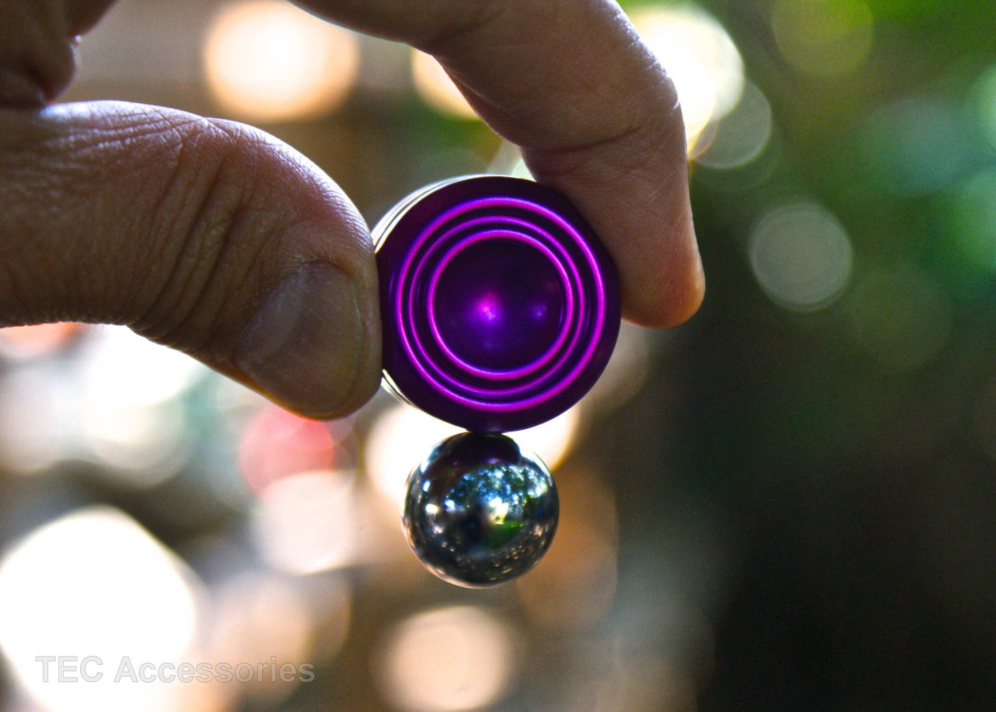 Purple Orbiter LT in Hand