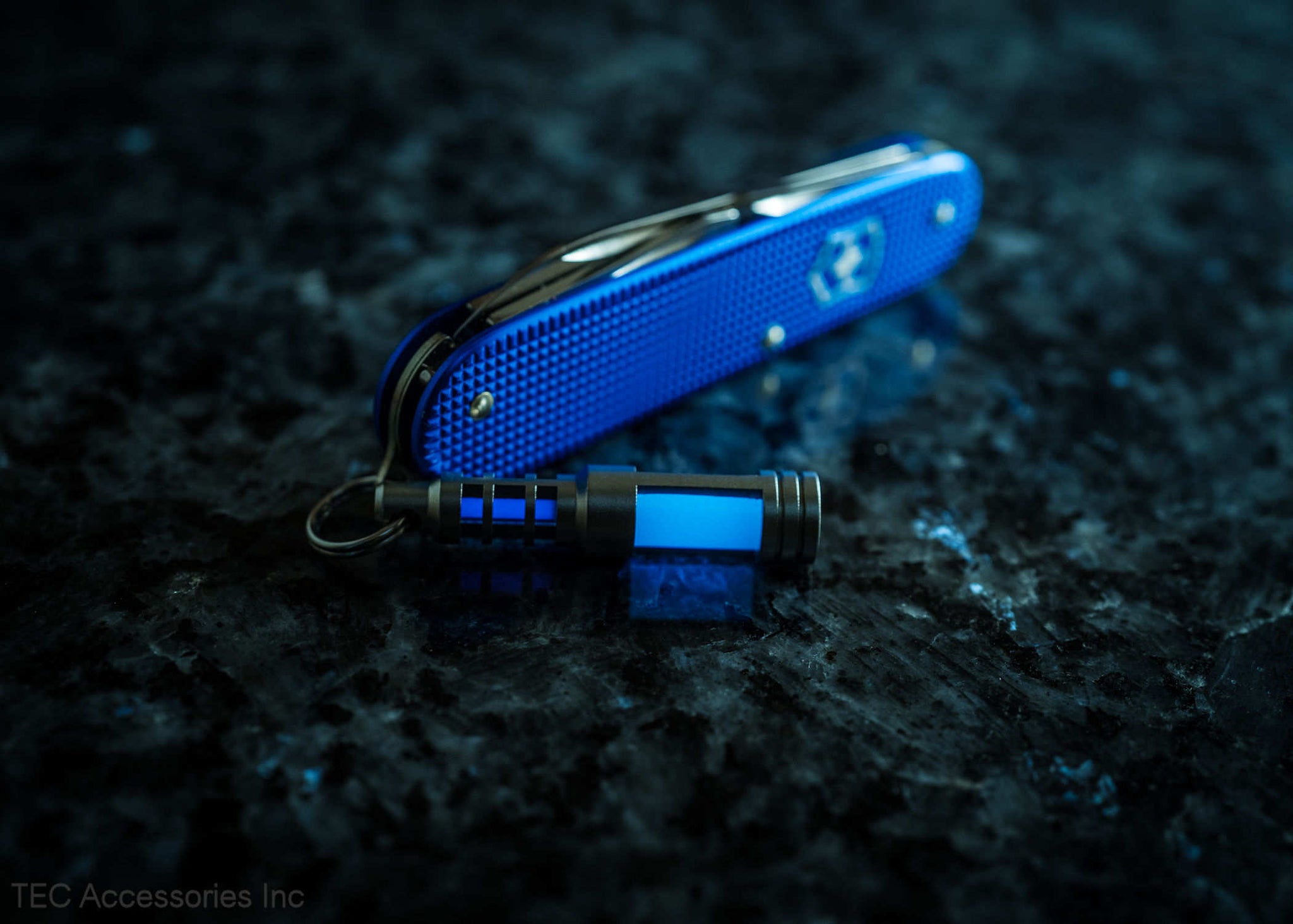 Isotope Chain Reaction Glow Fob on blue SAK