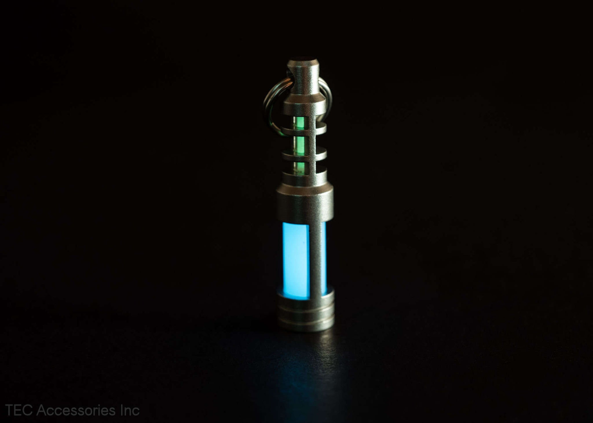 Isotope Chain Reaction Glow Fob at night