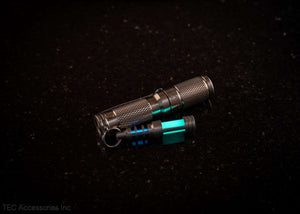 Isotope Chain Reaction Glow Fob on flashlight