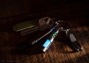 Isotope Chain Reaction Glow Fob on keychain